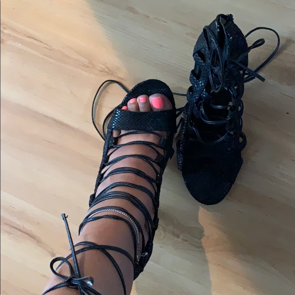 Black leather string ups